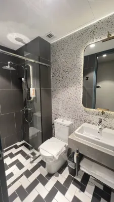 Sleeping Lion Suites Kamar Photos