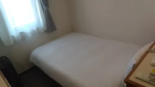 Smile Hotel Kitaasaka Kamar Photos