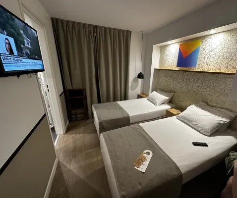 Hôtel Izzy Chambres Photos