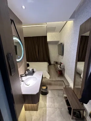 Travel World Hotel Chambres Photos