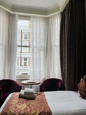 The Park City Grand Plaza Kensington Hotel Camere Photos