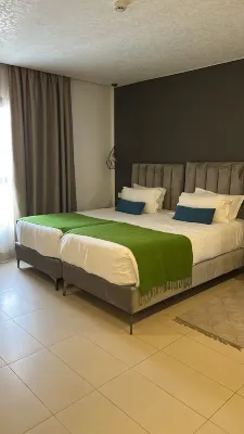 Maia Hotel Suites Rooms Photos