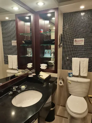Qianmen Jianguo Hotel Zimmer Photos