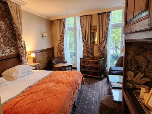Au Manoir Saint-Germain des Prés. Chambres Photos