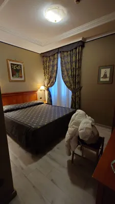 Hotel Rimini - Roma Camere Photos