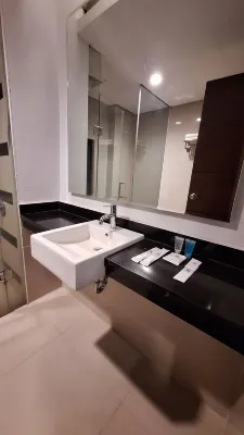 Novena Hotel Kamar Photos