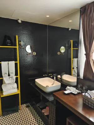 Likto Hotel (Guangzhou Taojin Metro Station) Zimmer Photos