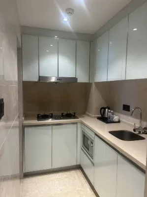 UHOME Executive Apartments Rooms Photos