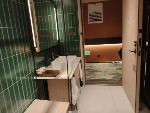 Orange Hotel Kamar Photos