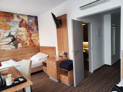 Akcent Hotel Chambres Photos