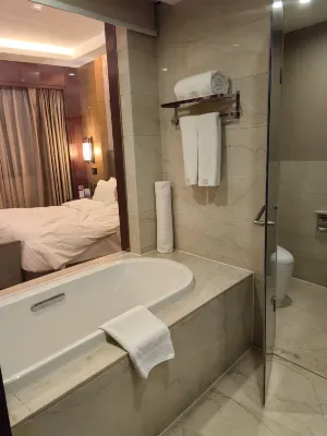Enlux Hotel (Baotu Quanquan City Plaza) Zimmer Photos