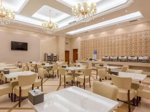 Vienna International Hotel (Guangzhou Xintang High Speed Railway Station Cowboy City Branch) Питание Photos