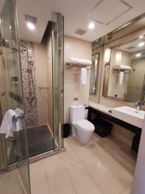 The Bauhinia Hotel Shenzhen (Luohu Port Grand Theatre Metro Station) Chambres Photos