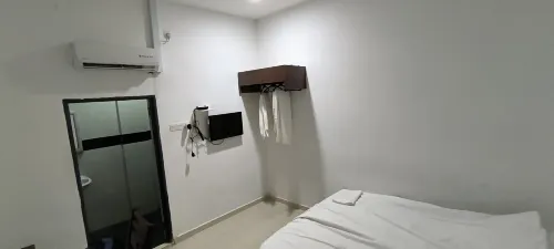 OYO 275 Senyum Inn Chambres Photos