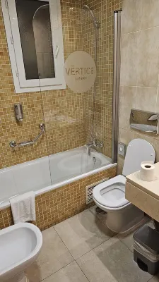 Vértice Sevilla Camere Photos