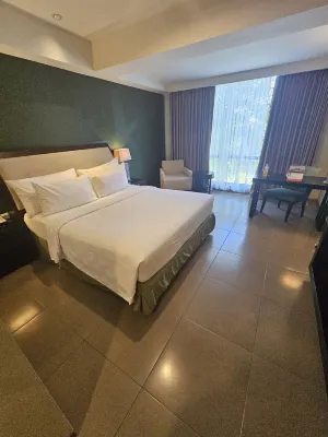Swiss-Belhotel Rainforest Kamar Photos