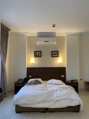 Ream Hotel Amman Zimmer Photos