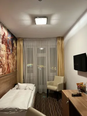 Akcent Hotel Chambres Photos