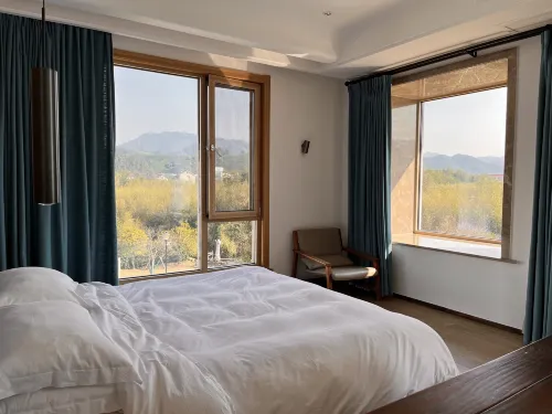 Qiyun·Anji Chashan Yelu Hot Spring Homestay الغرف Photos