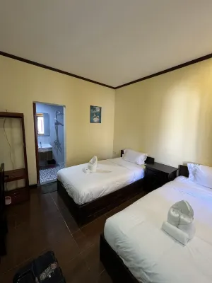 We House Guest House Kamar Photos
