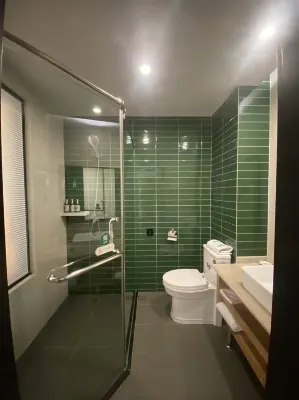 GreenTree Inn Zhixun (Dalian Zhoushuizi Airport Xinzhaizi Metro Station) الغرف Photos