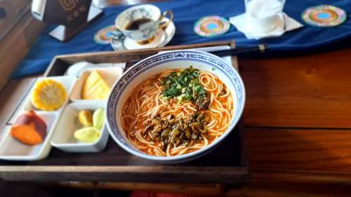 Lijiang Fengyasong Wenjinyuan Chinese Inn · Naxi Guyuan Ristorazione Photos