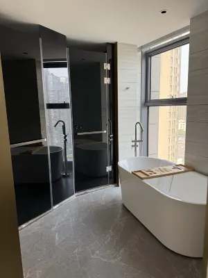 Echarm Plus Hotel (Wuxi Changjiang North Road Taihu Garden Metro Station) Kamar Photos