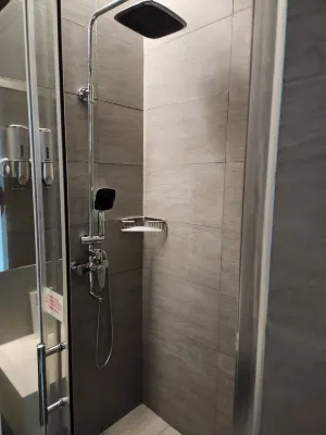 One Central Hotel & Suites Rooms Photos