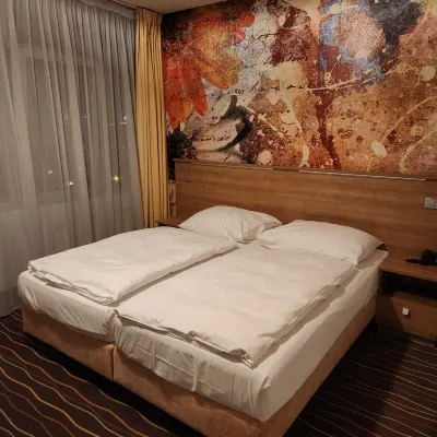Akcent Hotel Chambres Photos