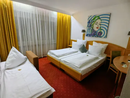 Centro Hotel Mondial München, Trademark Collection by Wyndham Zimmer Photos