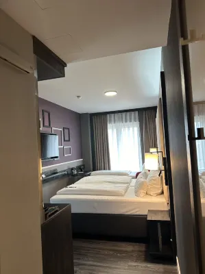PLAZA Premium Heidelberg Rooms Photos