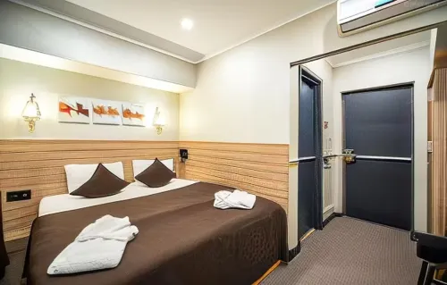 Mildom City Hotel Chambres Photos
