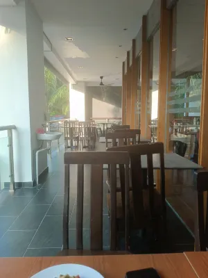 Hotel Primera Suite Makanan Photos