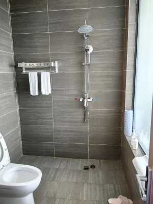 Qingwu Hotel Rooms Photos
