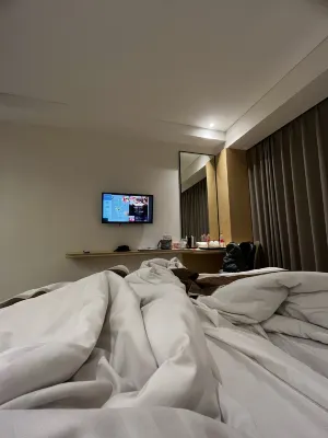 Azana Style Hotel Madura Kamar Photos