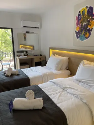 Skykhan Otel Huoneet Photos