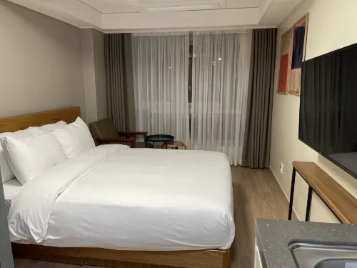 Chungchoho Best Hotel Номера Photos