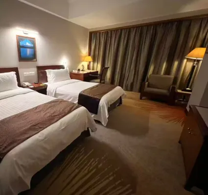 Baolong Hotel Rooms Photos