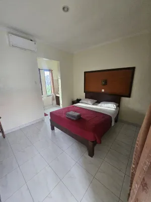 Teges Inn Kuta Camere Photos