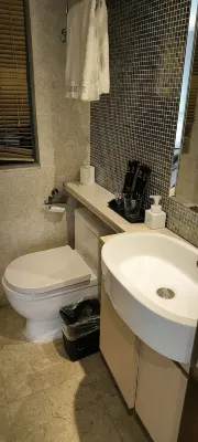 UHOME Executive Apartments Rooms Photos