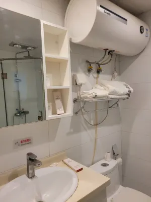 Guan County Hong Pu Traders Hotel Rooms Photos