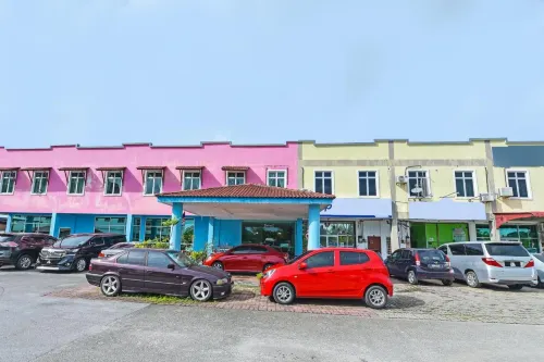 OYO 275 Senyum Inn Extérieur Photos