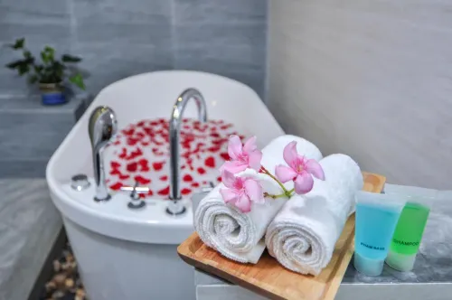 Triton Beach Hotel & Spa Rooms Photos