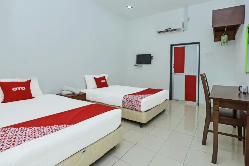 OYO 275 Senyum Inn Photos