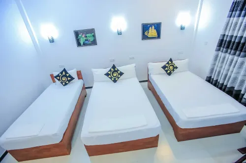 Sunstar Nilaveli Rooms Photos