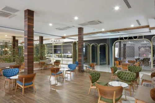 Nirvana Cosmopolitan Hotel - Convention & Sports Center Photos