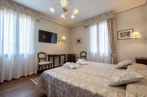 Hotel la Meridiana Habitaciones Photos