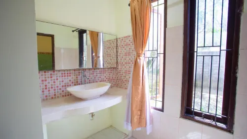 Teges Inn Kuta Camere Photos