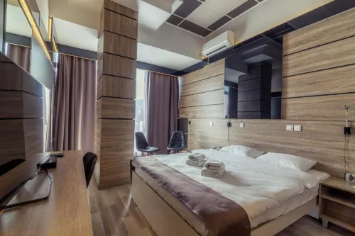 Hotel De KOKA Kamar Photos