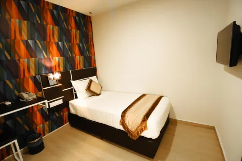 K GARDEN HOTEL PARIT BUNTAR Chambres Photos